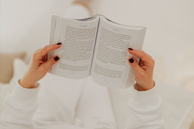 Romance and fantasy books styled as a services backdrop